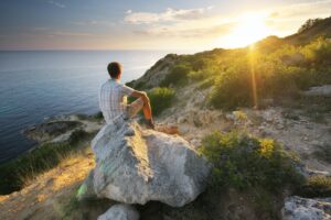 Man and sunrise